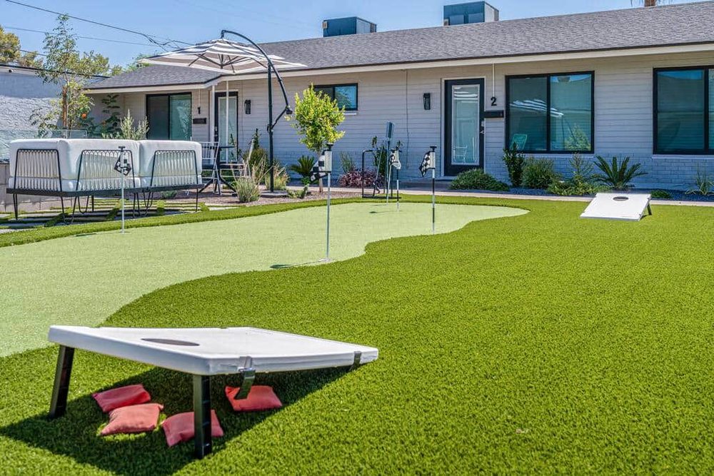 Putting green and cornhole at Second Sunrise Recovery