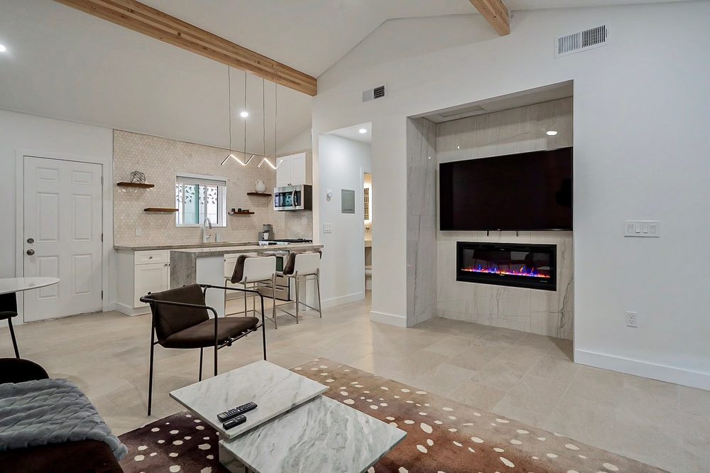 Suite living room with fireplace at Second Sunrise Recovery