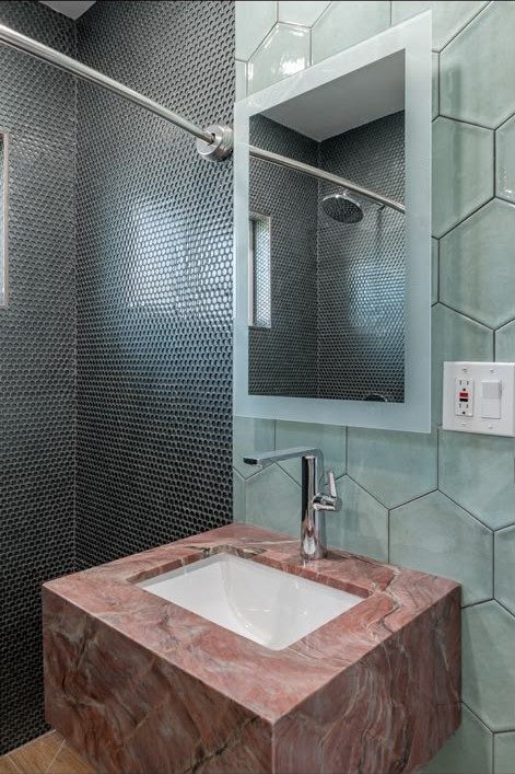 Suite bathroom with marble vanity at Second Sunrise Recovery