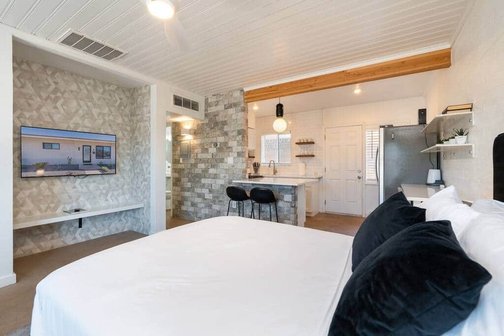 Modern loft-style suite bedroom at Second Sunrise Recovery